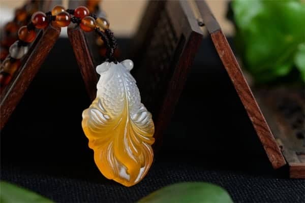 jade fish pendant meaning benefits of wearing fish pendant